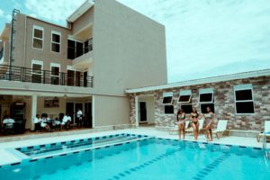 Female guests at swimming pool Hotel Le Confidential Arua City Uganda West Nile Region Uganda Hotel