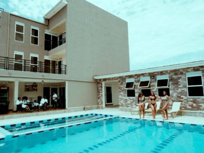 Female guests at swimming pool Hotel Le Confidential Arua City Uganda West Nile Region Uganda Hotel