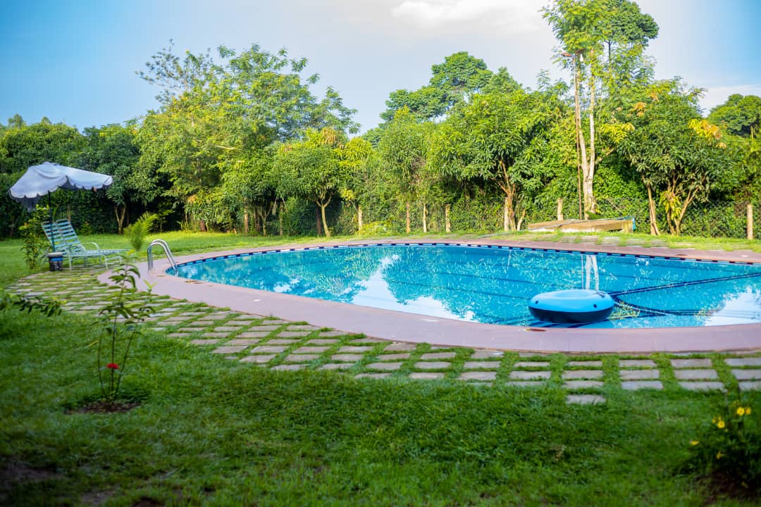 Outdoor swimming pool Photo Tusubira Village Cottages Hotel Jinja Uganda Eastern Region