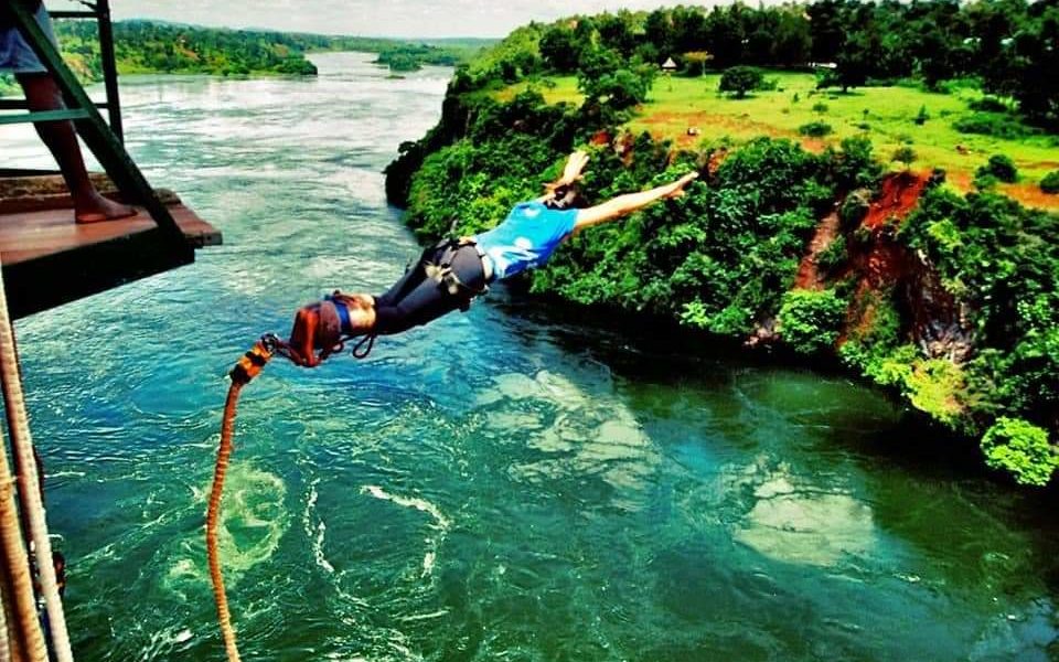 foreign visitor taking bungee jump at the Nile in Jinja Uganda photo by Visit Jinja City