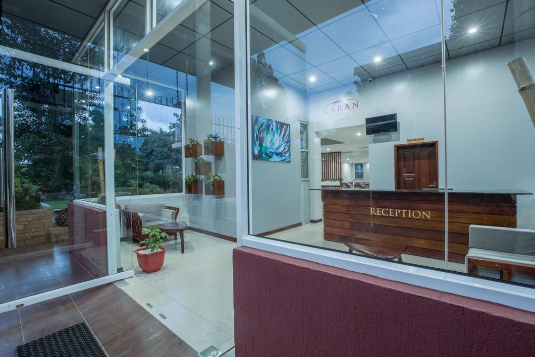 Caran Hotel Kampala front desk or reception area