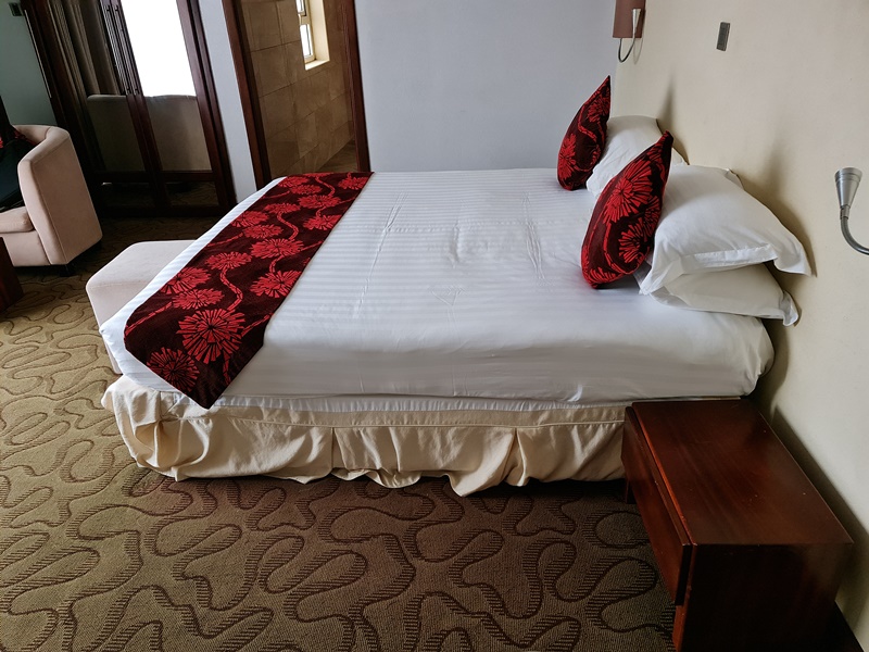 Executive bedroom with bathroom view photo Imperial Heights Hotel Entebbe Uganda Central Region