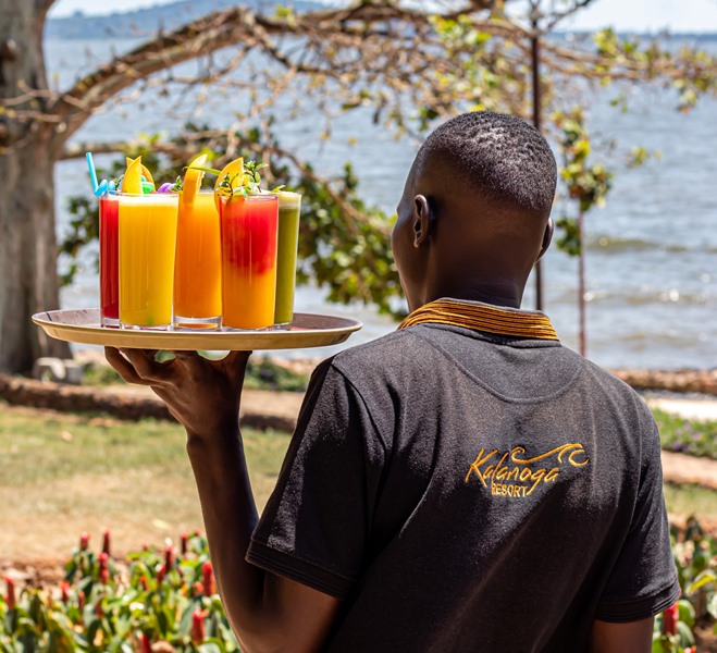 Waiter with Drinks Photo Kalanoga Beach Resort Busabala Hotel, Kampala, Uganda Central Region