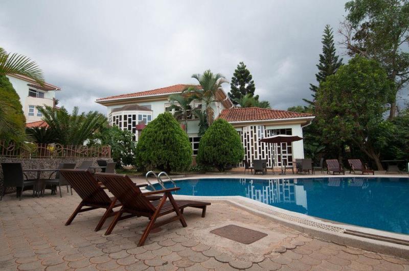 Swimming pool and chairs photo Imperial Heights Hotel Entebbe Uganda Central Region