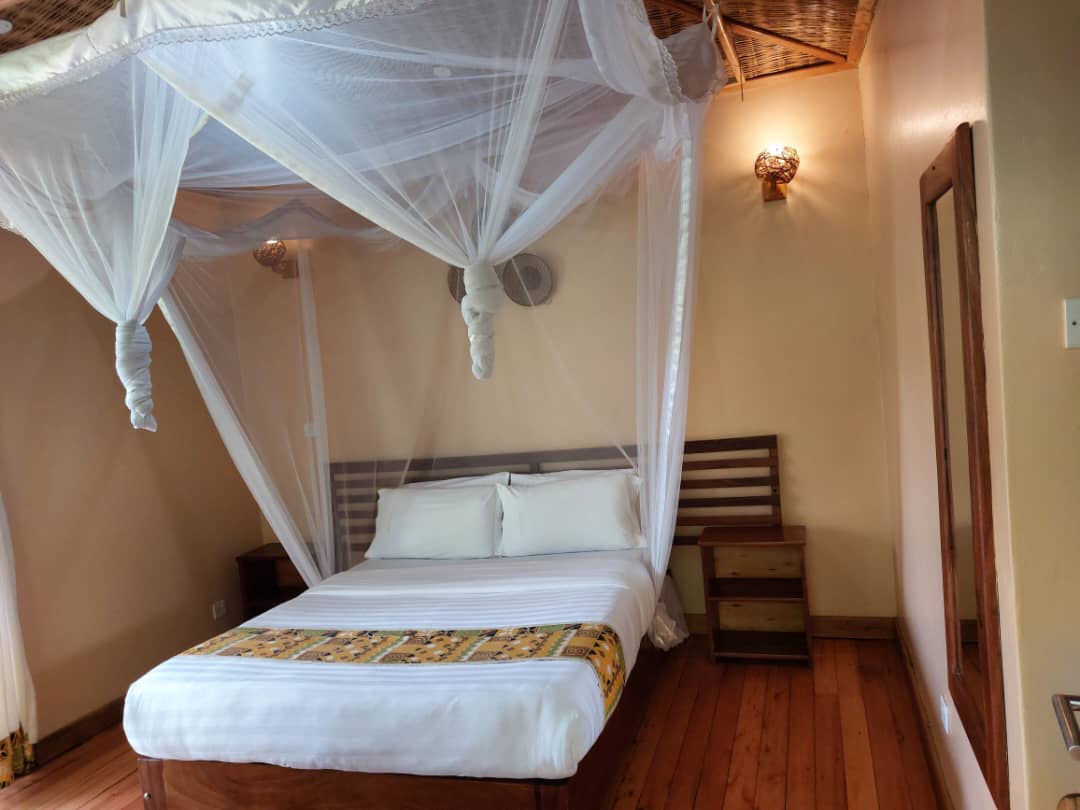 Canary Bedroom photo Ichumbi Gorilla Lodge, Kisoro Uganda