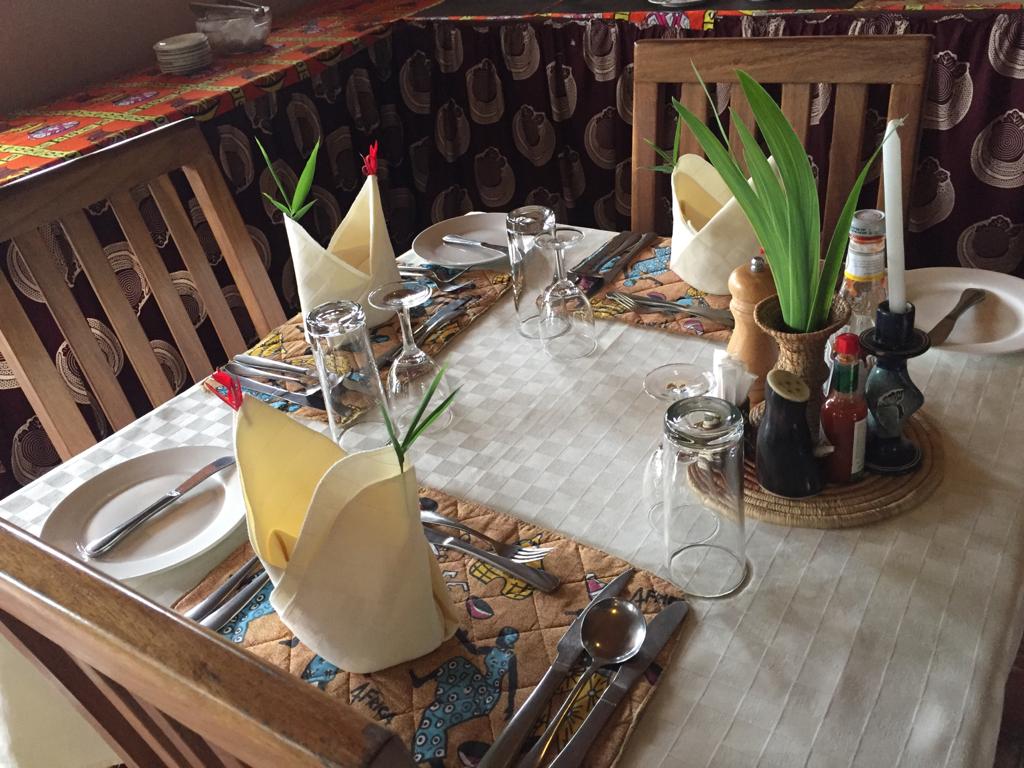 Restaurant table setup photo Ichumbi Gorilla Lodge, Kisoro Uganda 1