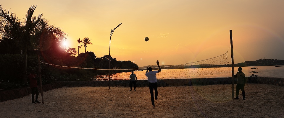 Volleyball Court at the Lake with Guests Playing Volleyball at Sunset Divine Resort and Spa Resort Mukono Hotel Mpatta Peninsula Lake Victoria Uganda Central Region