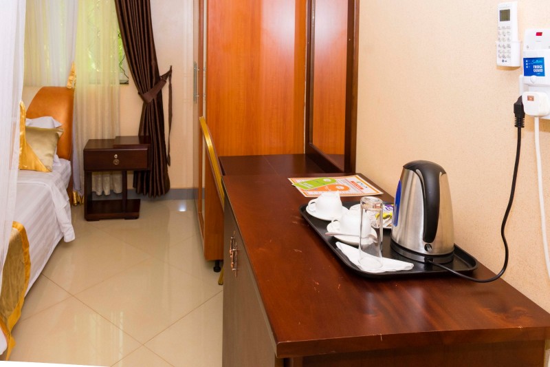 Executive Suite Bedroom Amenities Photo Nican Resort Hotel Sseguku Katale Entebbe Kampala Central Uganda