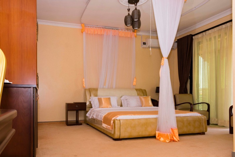 Executive Suite Bedroom furniture Photo Nican Resort Hotel Sseguku Katale Entebbe Kampala Central Uganda