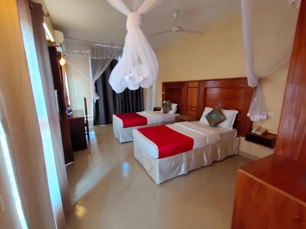 Standard Twin Bedroom photo Pulickal Airport Hotel Entebbe, Uganda Central Region 2