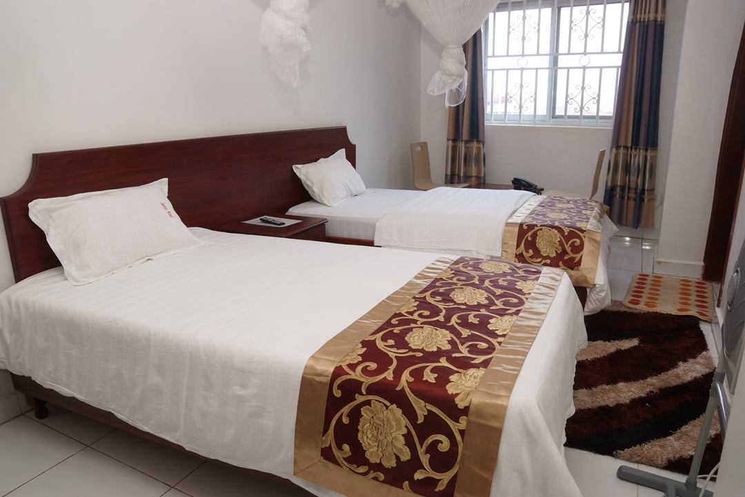 Deluxe Twin Bedroom photo Sunrise Hotel Bunamwaya, Kampala Uganda Central Region 1