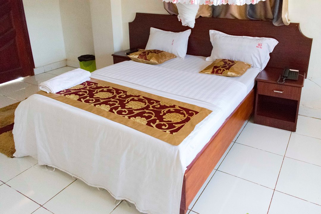 Deluxe Double Bedroom photo Sunrise Hotel Bunamwaya, Kampala Uganda Central Region 01