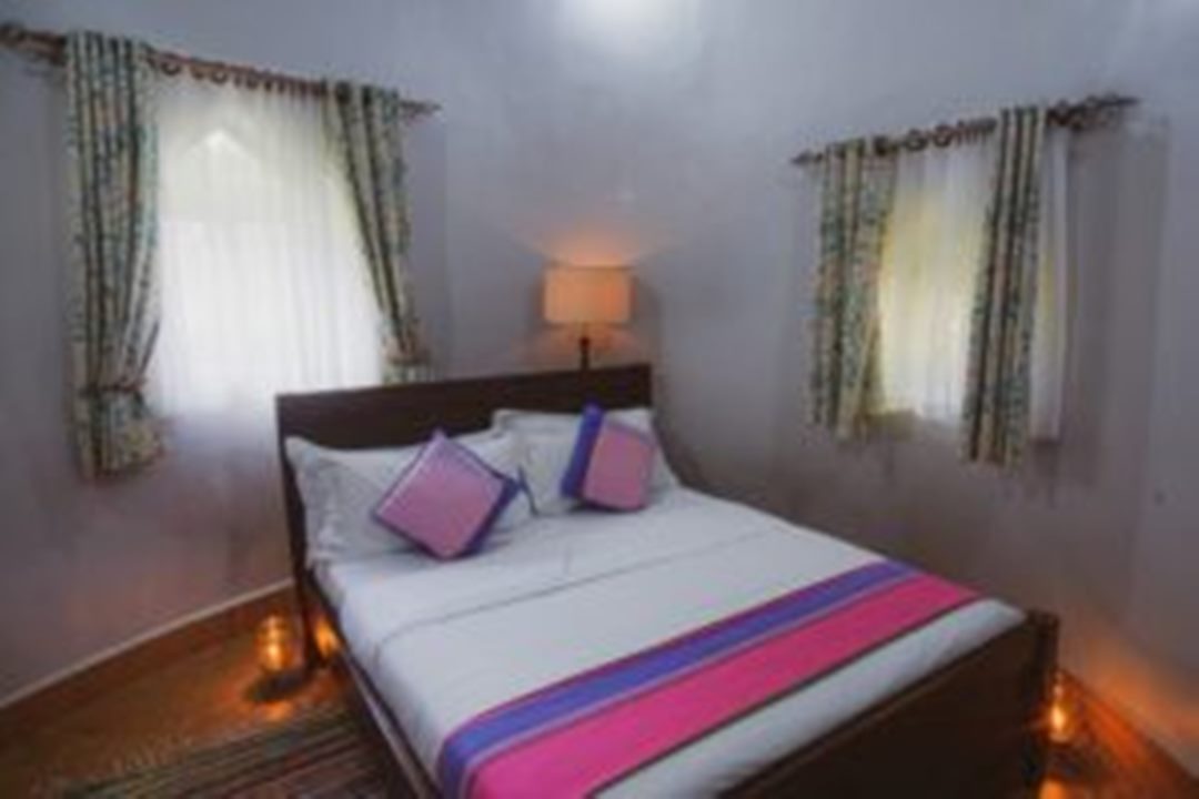 Family Occupancy bedroom Double bed photo Natures Green Beach Resort Kaazi, Kampala Uganda Central Region