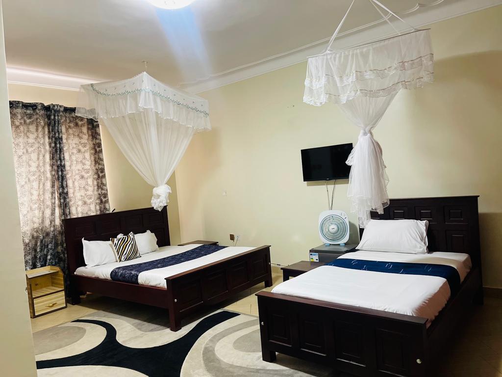 Deluxe Twin Bedroom photo J&l Safari Suites Hotel Entebbe - Uganda Central Region 1