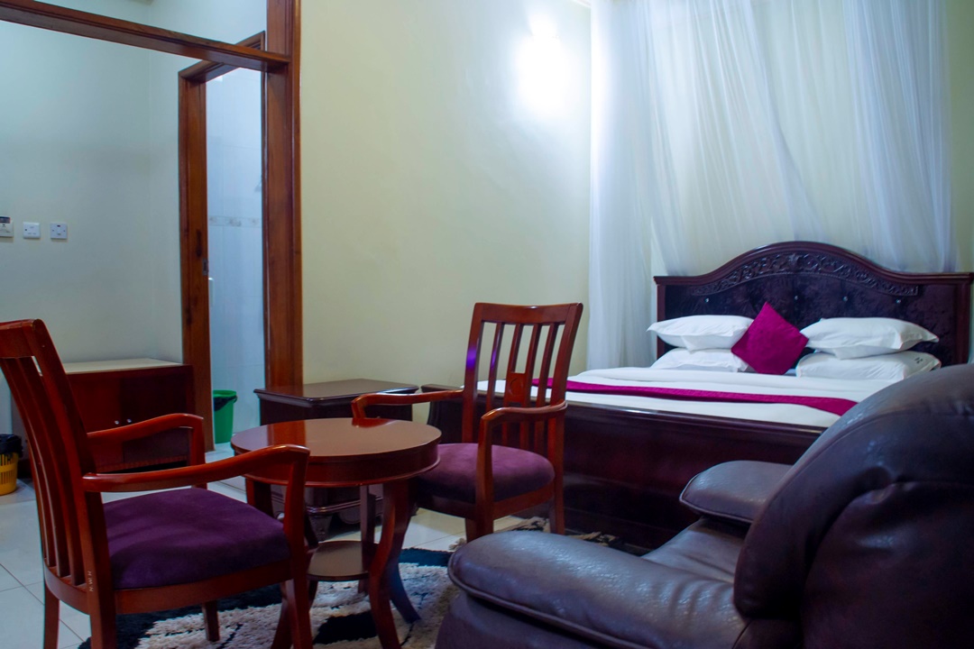 Double Bedroom showing the living area photo Sir Jose Hotel Ggaba Kampala, Uganda Central Region