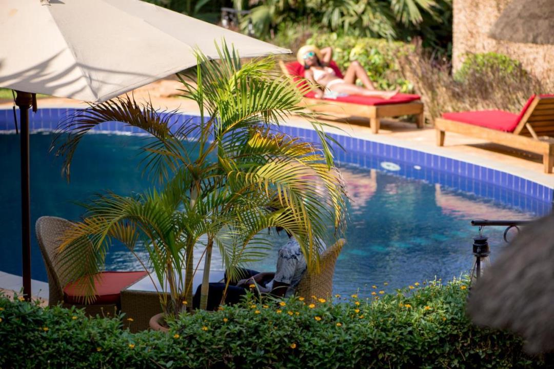 Outdoor swimming pool photo Le Petit Village Hotel Kampala, Uganda Central Region