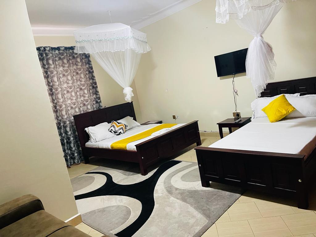 Deluxe Twin Bedroom photo J&l Safari Suites Hotel Entebbe - Uganda Central Region