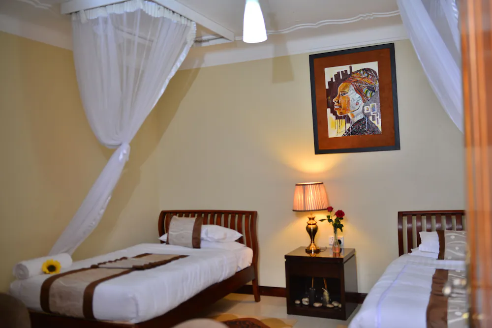 Twin Bedroom Photo Royal Victoria House Kampala, Uganda Central Region 2