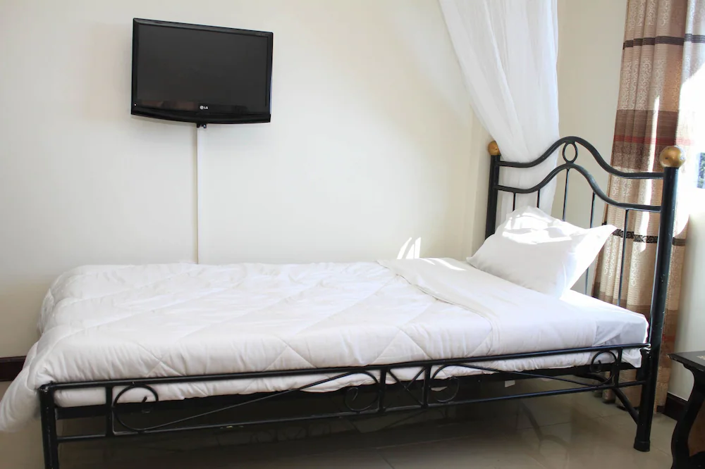 Single Bedroom Photo Karibu BB Suites Entebbe - Hotels | Entebbe, Uganda Central Region