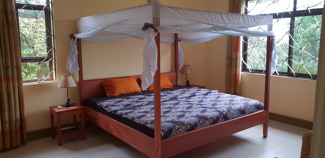 Deluxe Double Bedroom Photo Blue Monkey Guest House - Hotels | Entebbe, Uganda Central Region