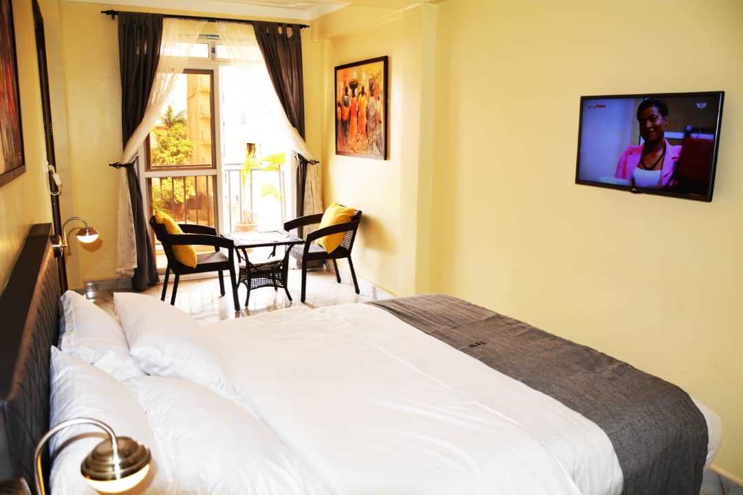 Deluxe Double Bedroom showing working space Photo Dana Hotel Kampala - Hotels | Kampala Uganda Central Region