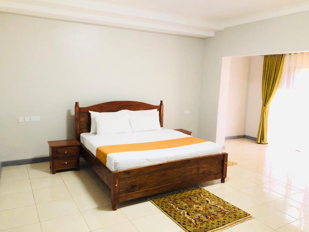 Deluxe Double Bedroom Photo HOTEL CWEZI BY THE LAKE Entebbe - Hotels | Entebbe, Uganda Central Region