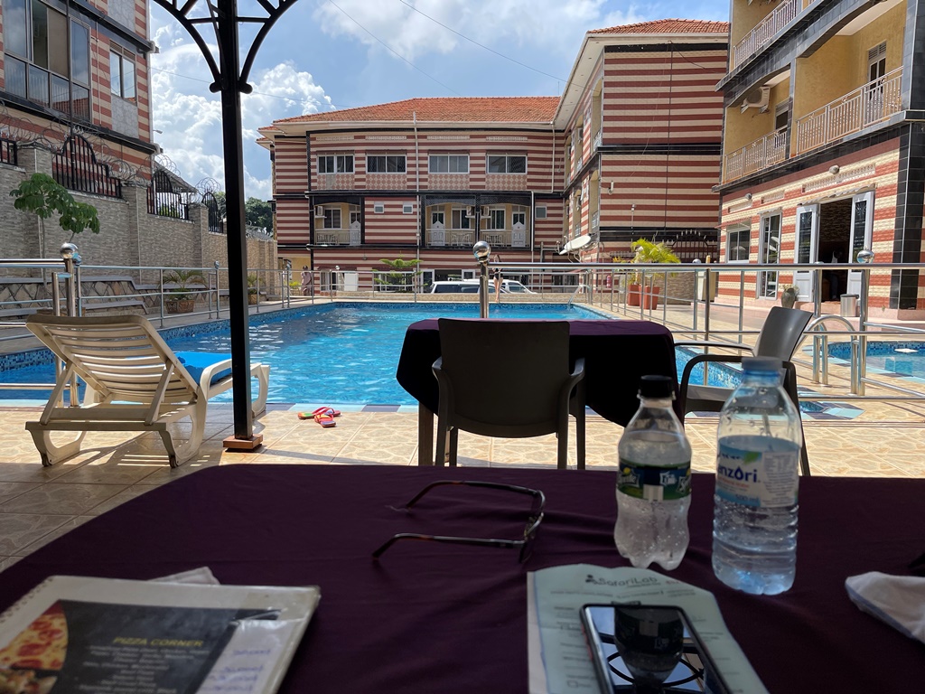 Outdoor swimming pool with sitting area Photo Innophine Hotel 790 - Hotels | Entebbe, Uganda Central Region