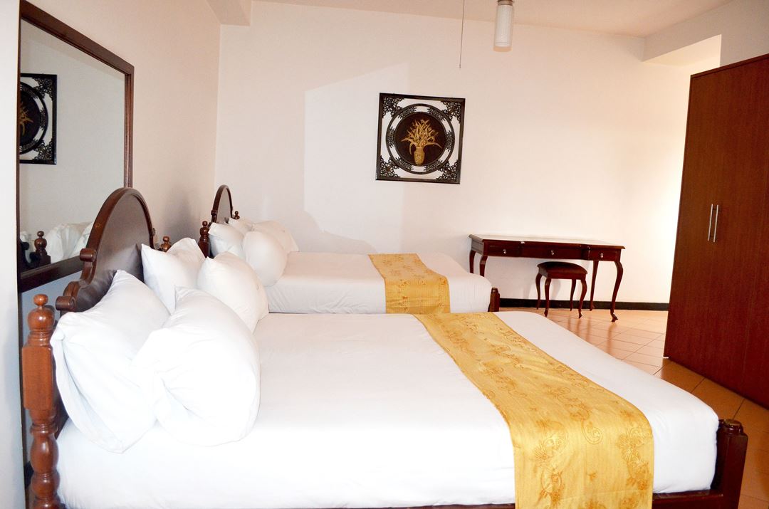 Twin Bedroom Photo Hotel Triangle Kampala - Hotels | Kampala Uganda Central Region 1