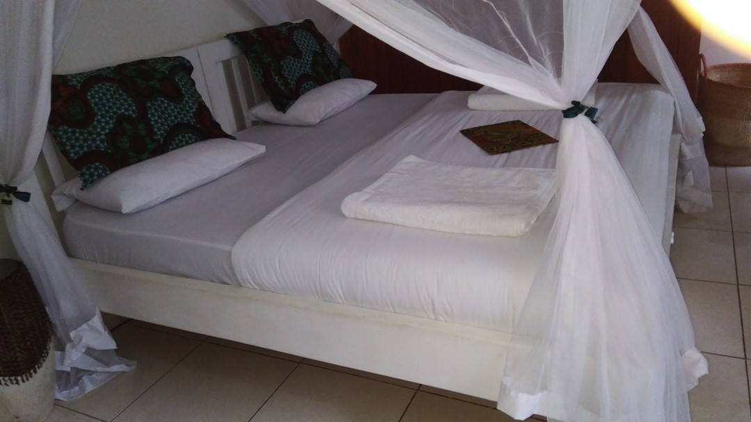 Deluxe Double Bedroom The Guinea Fowl Hotel - Hotels | Entebbe, Uganda Central Region