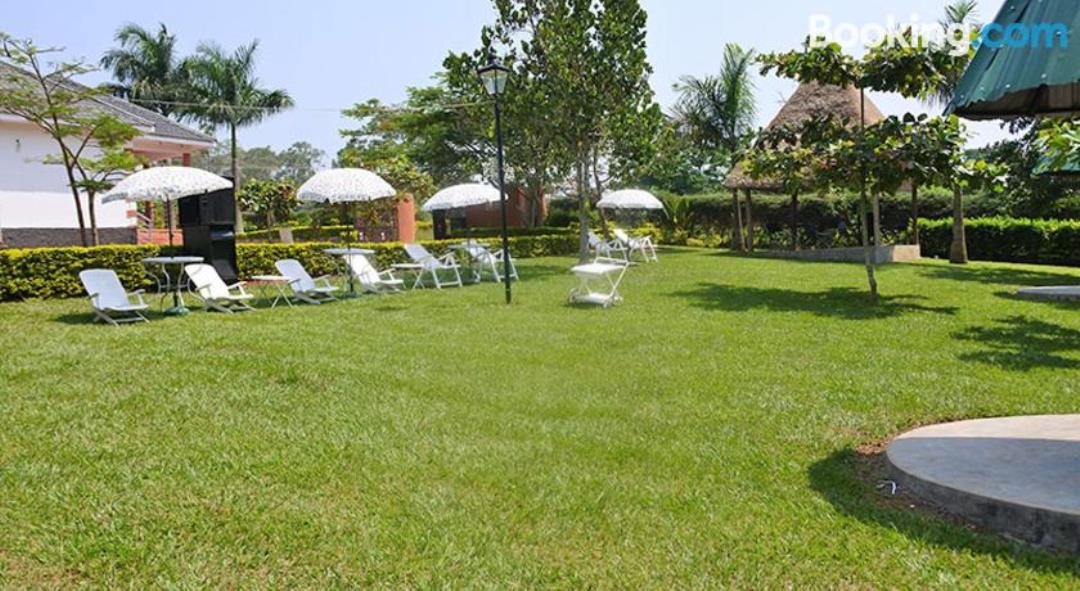 Gardens Photo Entebbe Palm Hotel - Hotels | Entebbe, Uganda Central Region