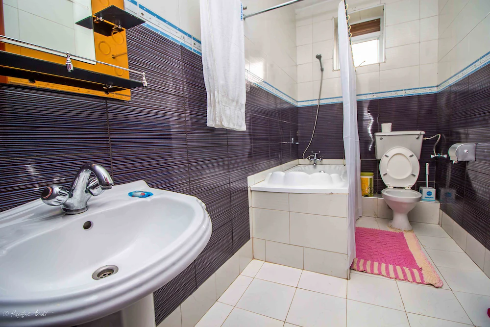 Bathroom Photo Innophine Hotel 790 - Hotels | Entebbe, Uganda Central Region