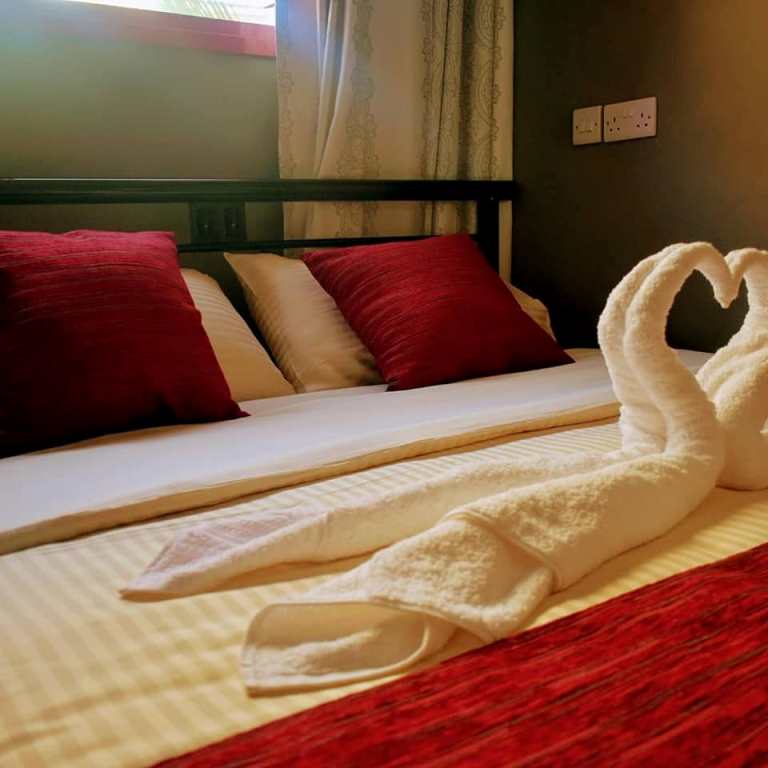 Standard Honeymoon Bedroom Photo Mahali Guesthouse Kampala - Uganda Central Region