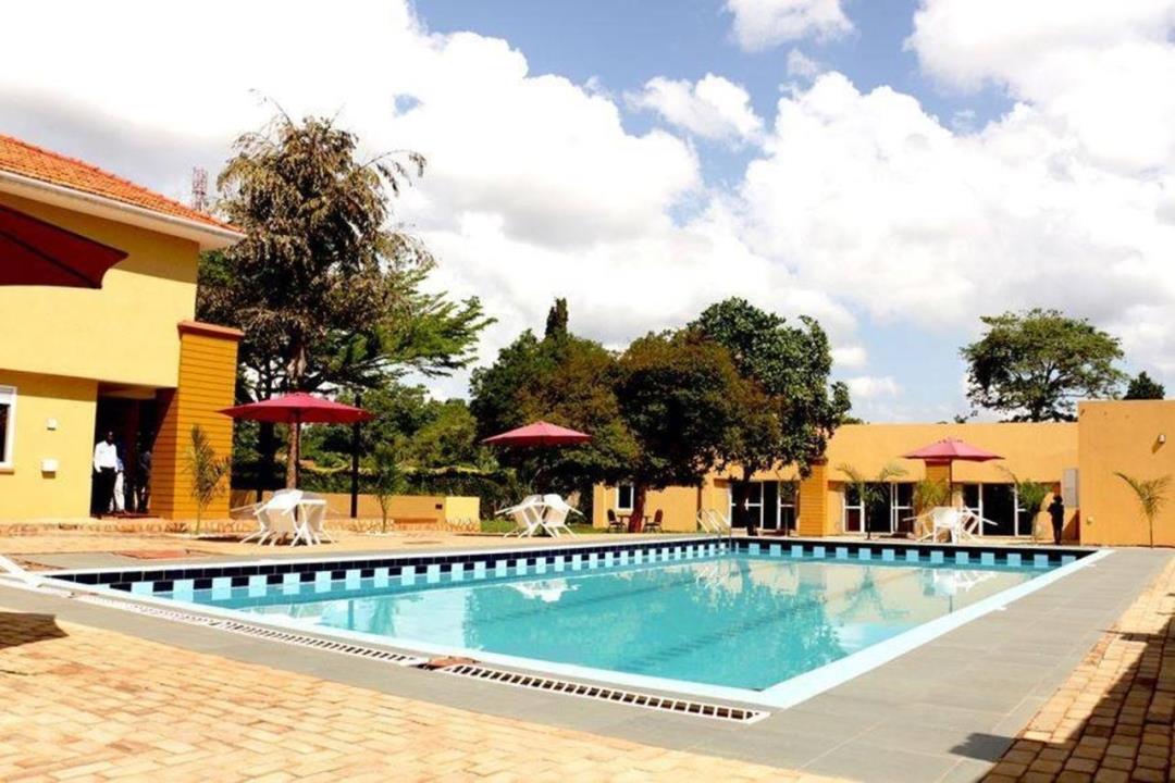 Property Exterior and pool view Photo The Mansion Hotel - Hotels | Jinja, Uganda Eastern Region