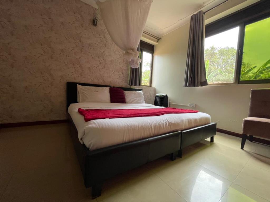 Deluxe Double Bedroom Photo Signature Hotel Apartments Jinja - Hotels | Jinja, Uganda Eastern Region 1