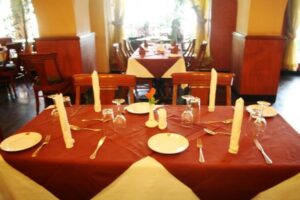 Restaurant table setup Photo Speke Hotel - Hotels | Kampala, Uganda Central Region