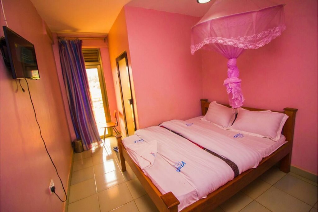 Standard Single Bedroom Photo Xcela Hotel - Hotels | Jinja, Uganda, Eastern Region