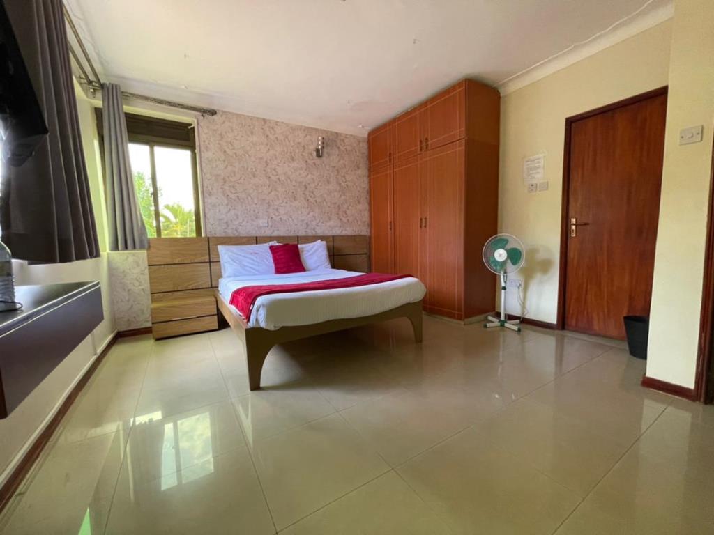 Double Bedroom Photo Signature Hotel Apartments Jinja - Hotels | Jinja, Uganda Eastern Region