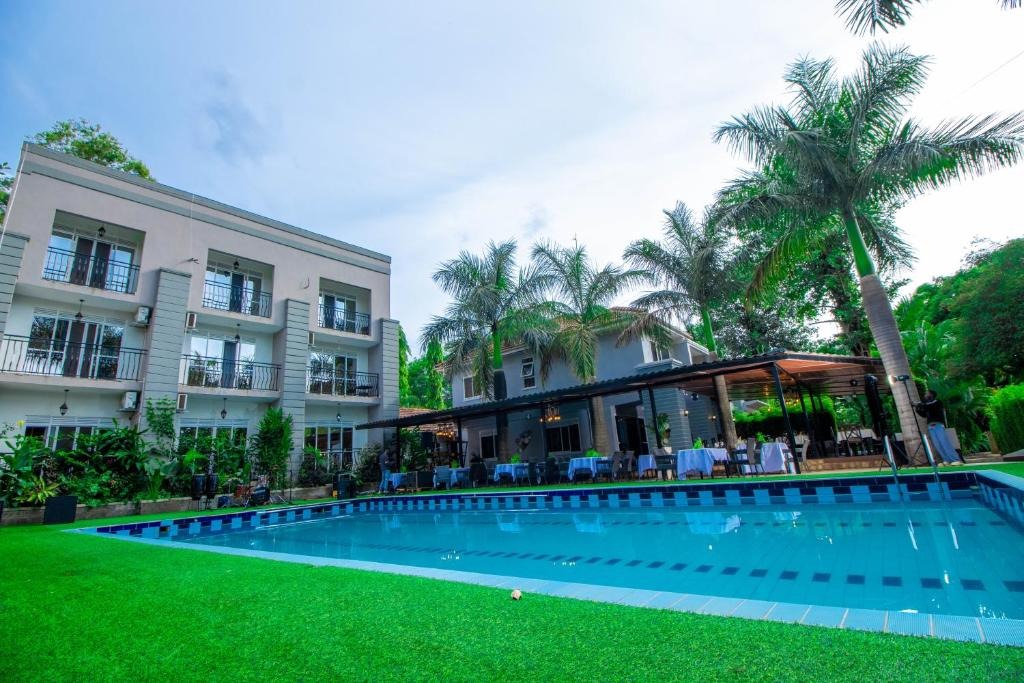 Property Exterior with pool view Photo The Mansion Hotel Jinja Uganda Eastern Region