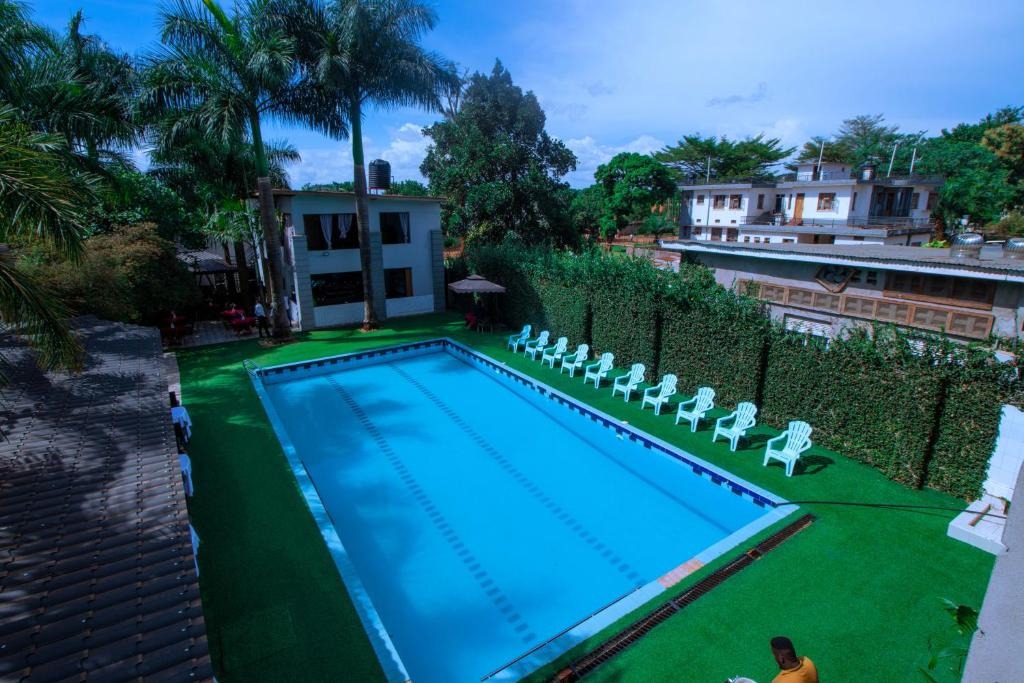 Outdoor swimming pool Photo The Mansion Hotel Jinja Uganda Eastern Region