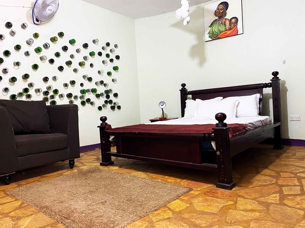 Double Bedroom Photo Afro Smile Hotel & Guest House Jinja - Hotels | Jinja, Uganda Eastern Region