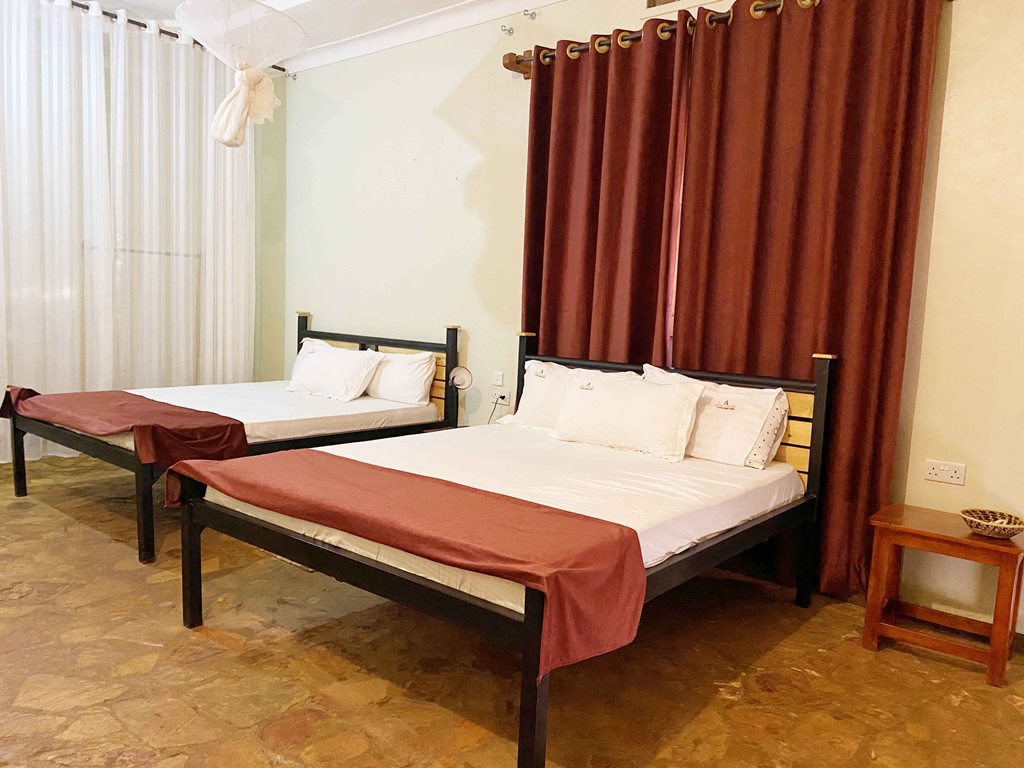 Twin Bedroom Photo Afro Smile Hotel & Guest House Jinja - Hotels | Jinja, Uganda Eastern Region