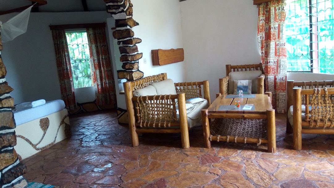 Living area in the suite Bedroom Photo Kingfisher Safaris Resort Hotel - Hotels | Jinja, Uganda Eastern Region