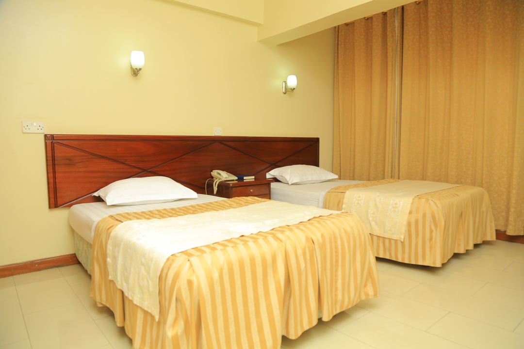 Deluxe Twin Bedroom Photo Nexus Resorts Hotel, Nansana, Kampala - Uganda Central Region 2