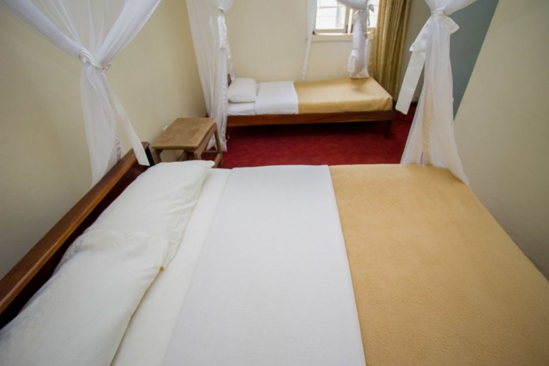 Standard Twin Bedroom Photo Emirina Travel Hotel - Hotels | Jinja, Uganda Eastern Region