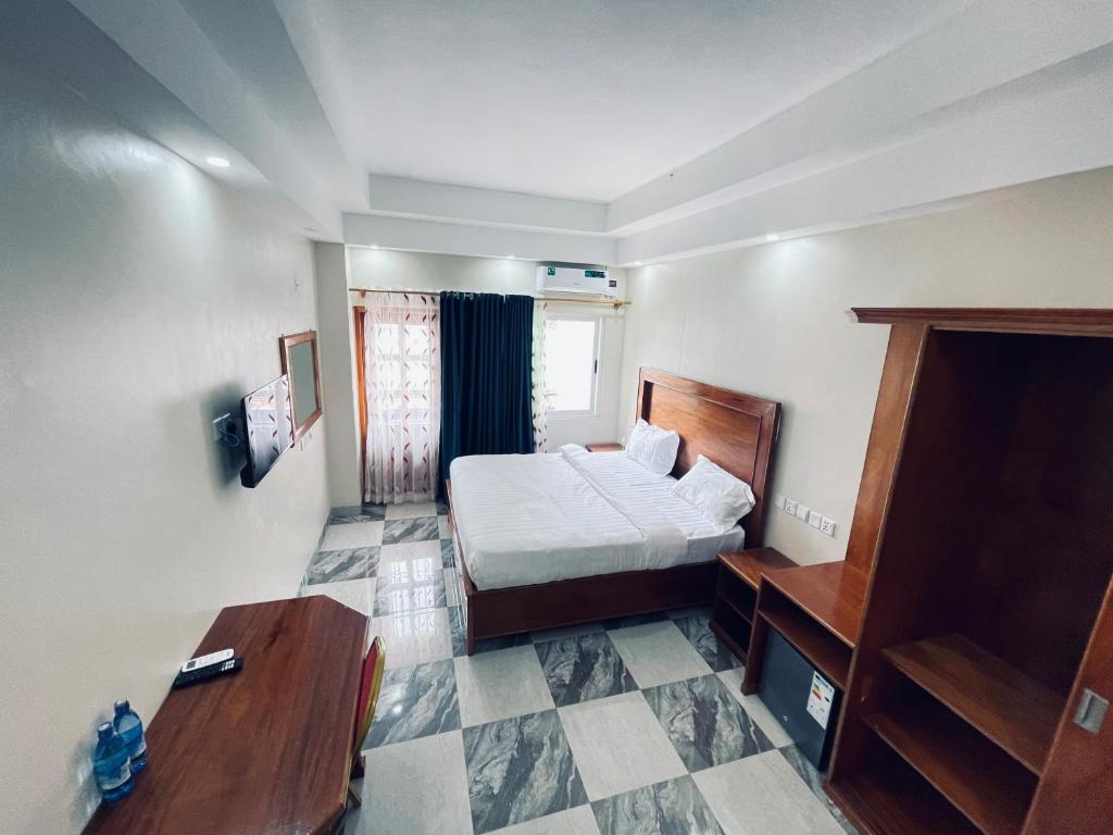 Deluxe Double Bedroom Photo Pulickal Heights Hotel Entebbe, Central Region