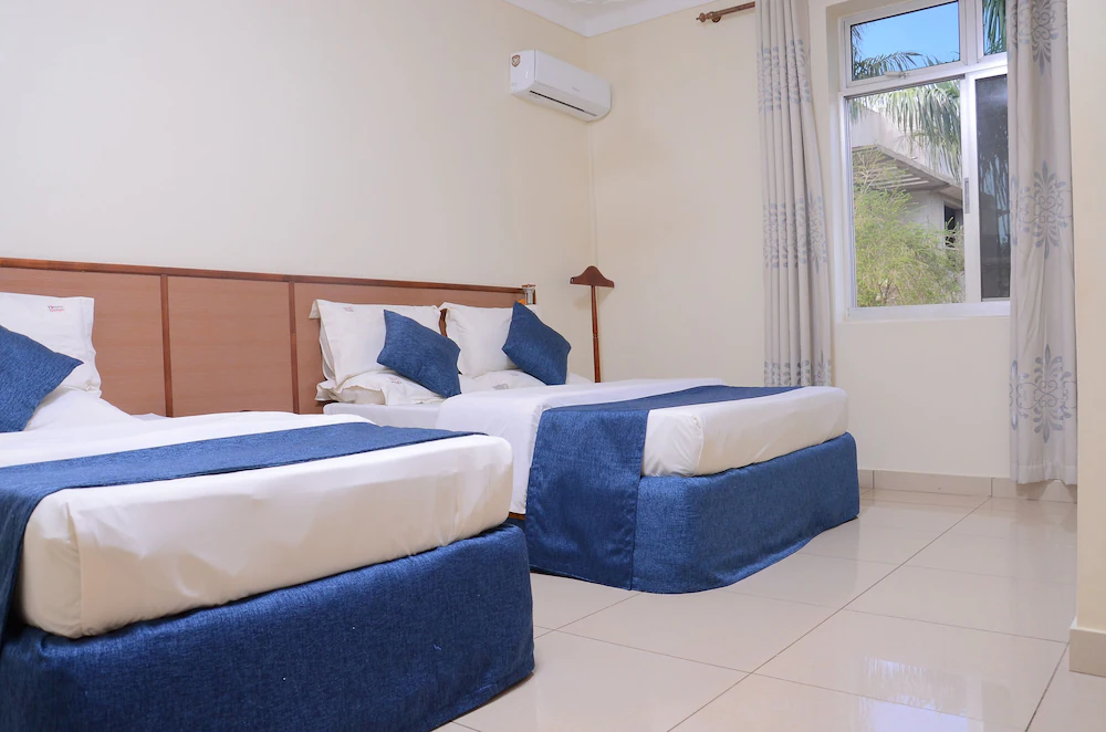 Deluxe Twin Bedroom Photo Nexus Resorts Hotel, Nansana, Kampala - Uganda Central Region 1