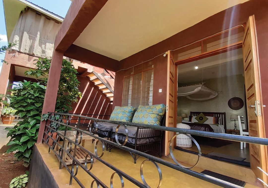 Cottage Bedroom with its balcony Photo Home on the Nile, Jinja Uganda Eastern Region