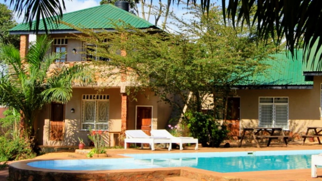 Property Exterior with pool view photo Surjios Guesthouse Jinja, Uganda Eastern Region