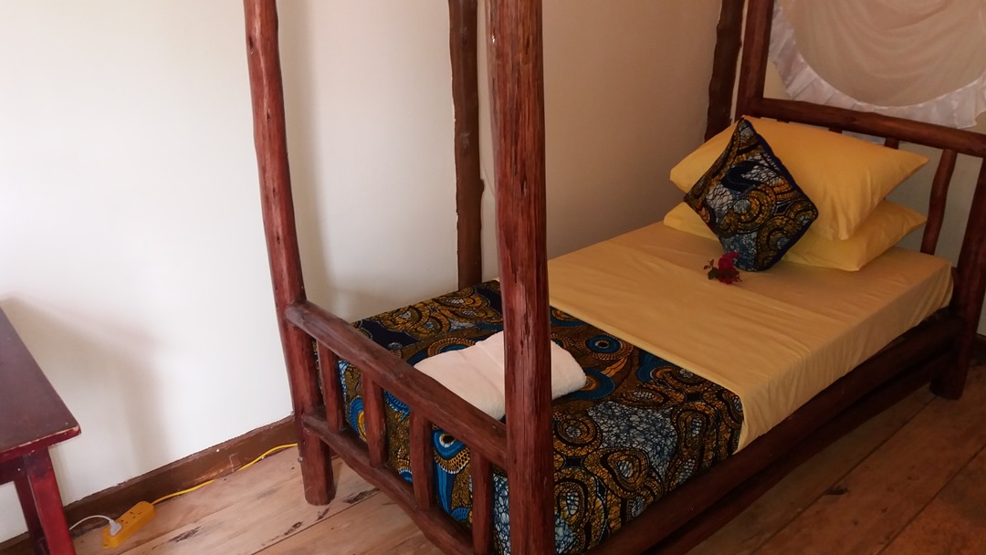 Standard Triple Bedroom Photo African Roots Guesthouse Entebbe, Uganda Central Region