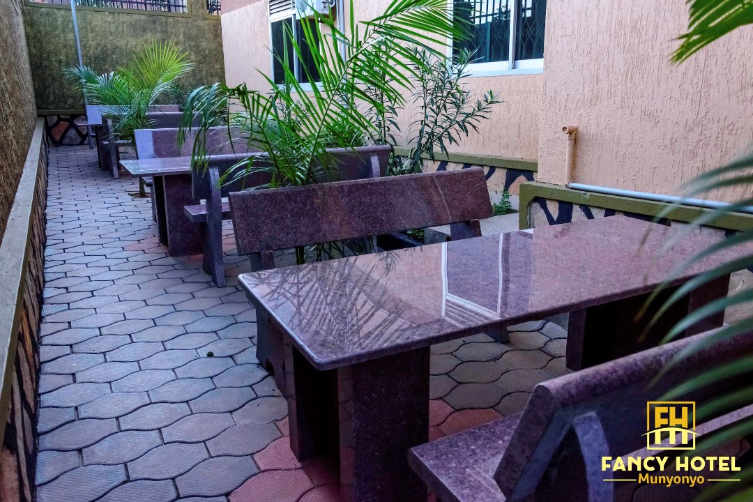 Outdoor sitting area Photo Fancy Hotel Munyonyo Kampala, Uganda Central Region